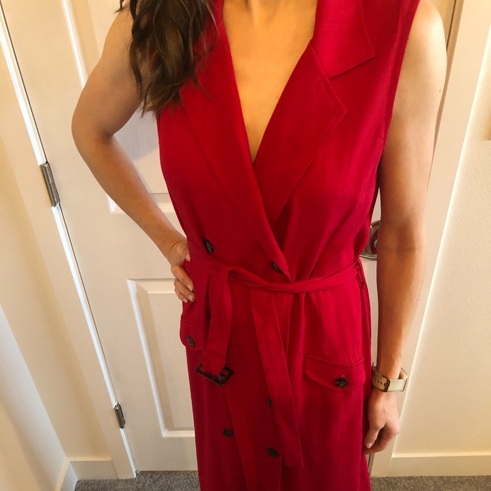 Double breasted long sleeveless trenchcoat style dress
